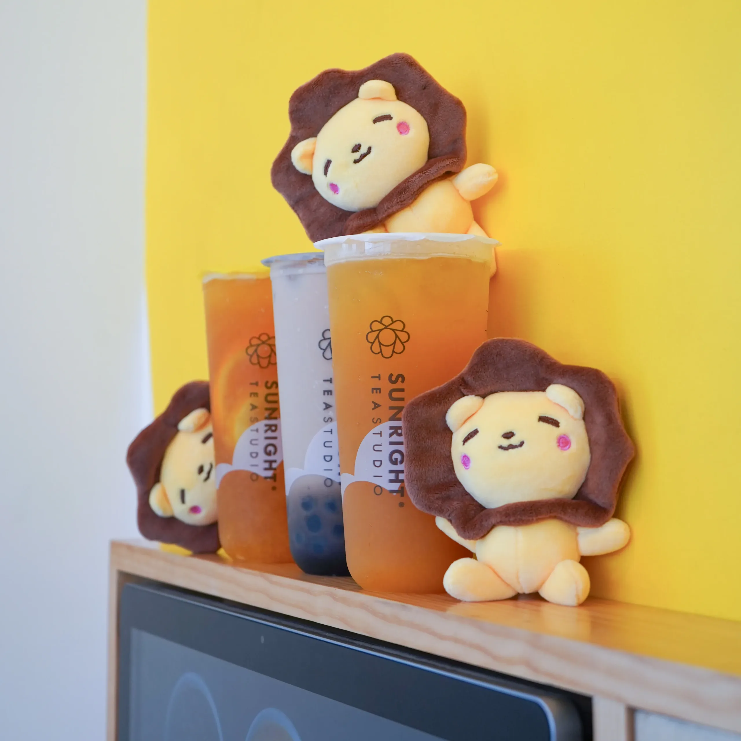 Three Sunny the Lion Dolls with 3 Sunright Drinks